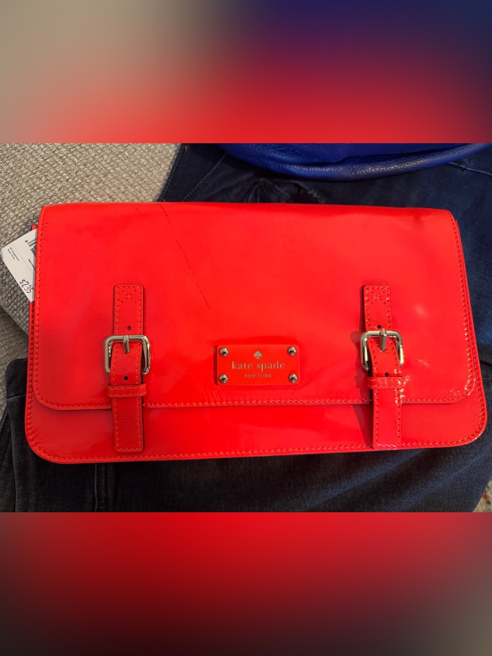 kate spade neon orange patent leather clutch with buckle accents